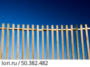 Beautiful wood fences over a great blue sky. Стоковое фото, агентство Ingram Publishing / Фотобанк Лори