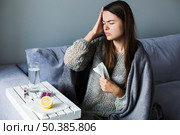 woman suffering from pain. Стоковое фото, агентство Ingram Publishing / Фотобанк Лори