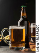 beer mug bottle arrangement. Стоковое фото, агентство Ingram Publishing / Фотобанк Лори