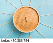 flat lay bamboo food steamer with chopsticks. Стоковое фото, агентство Ingram Publishing / Фотобанк Лори