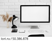 front view desk with computer lamp. Стоковое фото, агентство Ingram Publishing / Фотобанк Лори