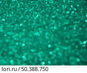 OLYMPUS DIGITAL CAMERA. unfocused turquoise glitter background. Стоковое фото, агентство Ingram Publishing / Фотобанк Лори