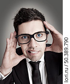 Funny portrait of a young businessman with a nerd glasses. Стоковое фото, агентство Ingram Publishing / Фотобанк Лори