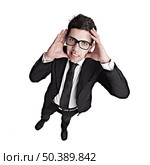 Funny portrait of a young businessman with a nerd glasses. Стоковое фото, агентство Ingram Publishing / Фотобанк Лори