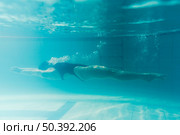 full shot swimmer swimming back. Стоковое фото, агентство Ingram Publishing / Фотобанк Лори