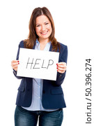 Business woman holding a paper with the word saying Help, isolated over white background. Стоковое фото, агентство Ingram Publishing / Фотобанк Лори