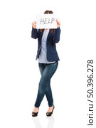 Business woman holding a paper with the word Help, isolated over white background. Asking for Help. Стоковое фото, агентство Ingram Publishing / Фотобанк Лори