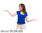 Beautiful young woman with arms open making a scale, isolated over a white background. Стоковое фото, агентство Ingram Publishing / Фотобанк Лори