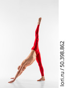 man stretching with white background. Стоковое фото, агентство Ingram Publishing / Фотобанк Лори