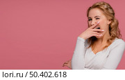 portrait woman laughing covers her mouth 2. Стоковое фото, агентство Ingram Publishing / Фотобанк Лори