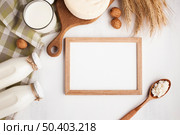 wooden frame mock up with dairy products. Стоковое фото, агентство Ingram Publishing / Фотобанк Лори