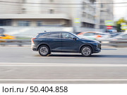 Haval Shenshou car moving on the street. SUV vehicle driving along sunny street in city with blurred background. Редакционное фото, фотограф Константин Григорьев / Фотобанк Лори