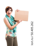 Beautiful woman holding a cardboard and admired with something on it, isolated over a white background. Стоковое фото, агентство Ingram Publishing / Фотобанк Лори