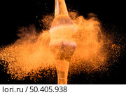 crushing big foundation brushes with color pigment. Стоковое фото, агентство Ingram Publishing / Фотобанк Лори