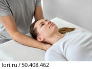 male therapist undergoing physical therapy with female patient 2. Стоковое фото, агентство Ingram Publishing / Фотобанк Лори