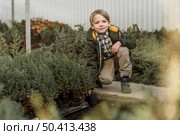 little boy tree nursery. Стоковое фото, агентство Ingram Publishing / Фотобанк Лори