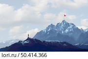 Business success challenge and climbing a high mountain metaphor as a businessman with a goal of retreiving a red flag from the peak or summit with 3D illustration elements. Стоковое фото, агентство Ingram Publishing / Фотобанк Лори