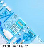 top view office stationery with calculator stapler. Стоковое фото, агентство Ingram Publishing / Фотобанк Лори