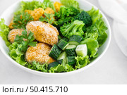 Chicken nuggets with broccoli, corn, cucumbers and salad lettuce. Стоковое фото, агентство Ingram Publishing / Фотобанк Лори