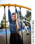 kid having fun playground alone. Стоковое фото, агентство Ingram Publishing / Фотобанк Лори
