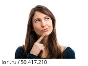 Beautiful woman isolated over a white background thinking on something. Woman thinking. Стоковое фото, агентство Ingram Publishing / Фотобанк Лори