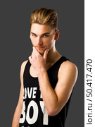 Studio portrait of a young fashion man . Стоковое фото, агентство Ingram Publishing / Фотобанк Лори