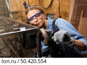 female welder working studio. Стоковое фото, агентство Ingram Publishing / Фотобанк Лори