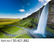 The amazing Seljalandsfoss waterfall in Iceland. Стоковое фото, агентство Ingram Publishing / Фотобанк Лори