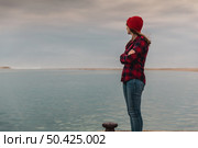 Beautiful woman felling cold near the lake. Стоковое фото, агентство Ingram Publishing / Фотобанк Лори