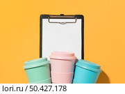 top view colorful reusable cups 2. Стоковое фото, агентство Ingram Publishing / Фотобанк Лори