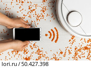 wireless controlled vacuum cleaner with smartphone. Стоковое фото, агентство Ingram Publishing / Фотобанк Лори