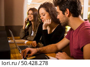 Students getting ready for final exams. Стоковое фото, агентство Ingram Publishing / Фотобанк Лори