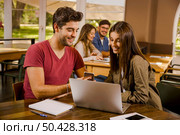 Studying working together for the final exams. Стоковое фото, агентство Ingram Publishing / Фотобанк Лори
