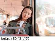 passenger travelling city by tram 2. Стоковое фото, агентство Ingram Publishing / Фотобанк Лори