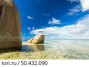 The beautiful Anse Source D’Argent beach in La Digue Island, Seychelles. Стоковое фото, агентство Ingram Publishing / Фотобанк Лори