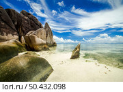 The beautiful Anse Source D’Argent beach in La Digue Island, Seychelles. Стоковое фото, агентство Ingram Publishing / Фотобанк Лори