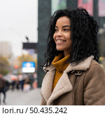 smiley woman looking away outdoors. Стоковое фото, агентство Ingram Publishing / Фотобанк Лори