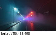 Colorful beaming led lights with white and red glow in darkness. Fog or mist lays on ground for creepy or scary mood. Concept danger or evacuation signs in futuristic movie style. Стоковое AI-видео, аниматор Sergey Grishin / Фотобанк Лори