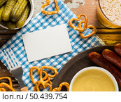 top view sausages with pretzels beer 2. Стоковое фото, агентство Ingram Publishing / Фотобанк Лори