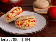 bunch arepas with filling plate. Стоковое фото, агентство Ingram Publishing / Фотобанк Лори