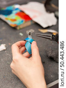 crafting hobby with metal object. Стоковое фото, агентство Ingram Publishing / Фотобанк Лори
