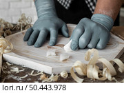 front view person crafting wood close up. Стоковое фото, агентство Ingram Publishing / Фотобанк Лори