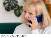 older woman talking phone home. Стоковое фото, агентство Ingram Publishing / Фотобанк Лори
