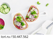 Sandwiches, toasts with salted herring and beetroot pate, top view. Стоковое фото, агентство Ingram Publishing / Фотобанк Лори