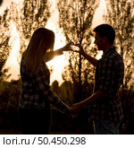 Young couple in love making promises of love. Стоковое фото, агентство Ingram Publishing / Фотобанк Лори