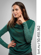 Beautiful happy woman smiling over a gray background. Стоковое фото, агентство Ingram Publishing / Фотобанк Лори