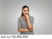 Portrait of a beautiful woman with a thoughtful expression. Стоковое фото, агентство Ingram Publishing / Фотобанк Лори