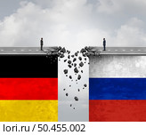 Germany And Russia Crisis relationship decline between Moscow and Berlin as a geopolitical and diplomatic challenge concept as a German and Russian person on a broken bridge in a 3D illustration style. . Стоковое фото, агентство Ingram Publishing / Фотобанк Лори
