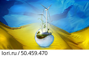 Wind turbines and solar panels overgrown with plants in green landscape with trees and sunrise inside yin-yang symbol made of water against of blue and yellow flag of Ukraine background. Concept of investments in alternative energy, green industry, rise of sustainable technologies in Ukraine.. Wind turbines and solar panels on Ukraine flag background. Стоковое фото, агентство Ingram Publishing / Фотобанк Лори