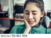 That woman had a toothache and a hand touch her cheek. Стоковое фото, агентство Ingram Publishing / Фотобанк Лори